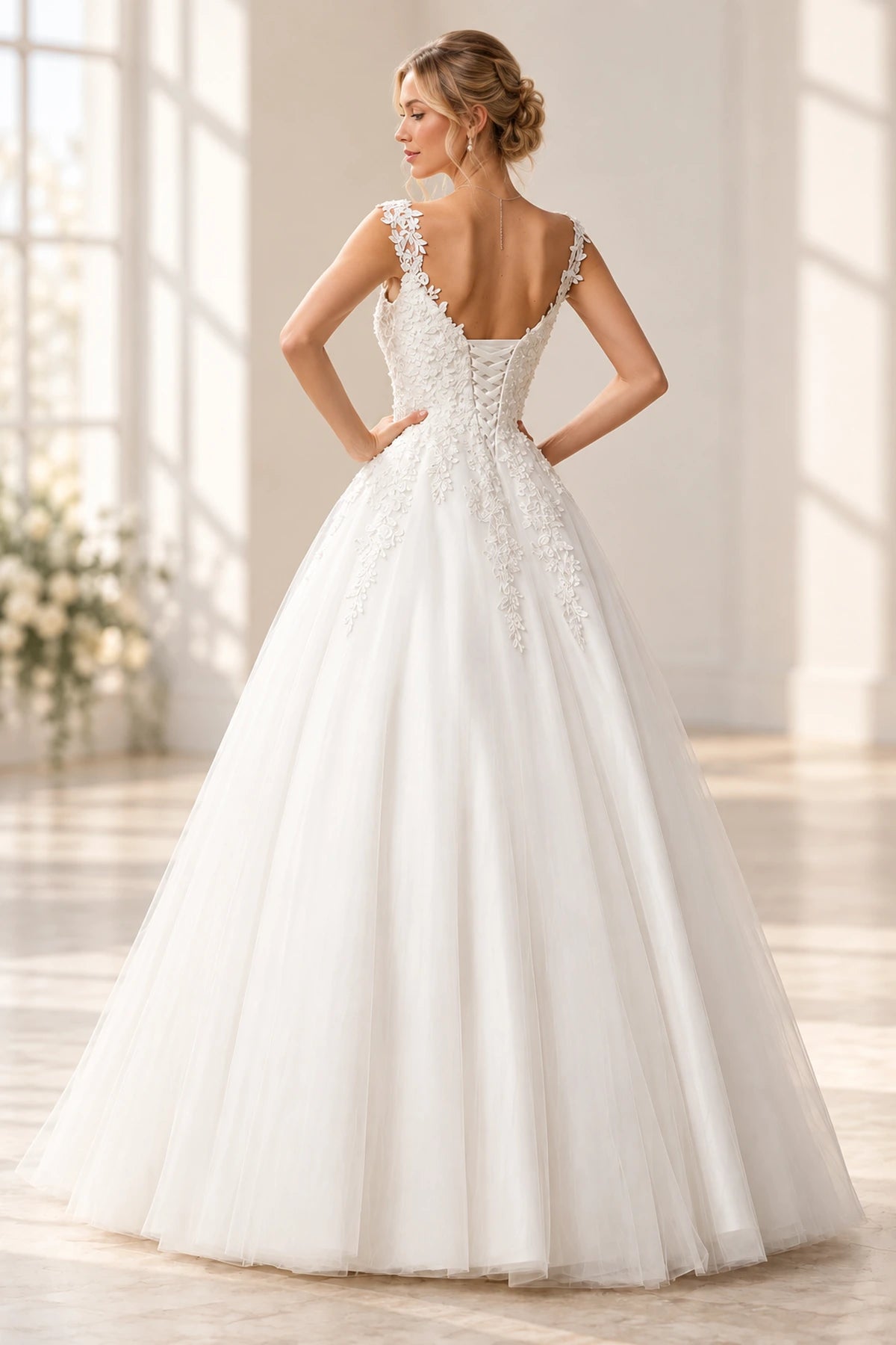 Back view of princess tulle wedding dress with floral lace-up corset back